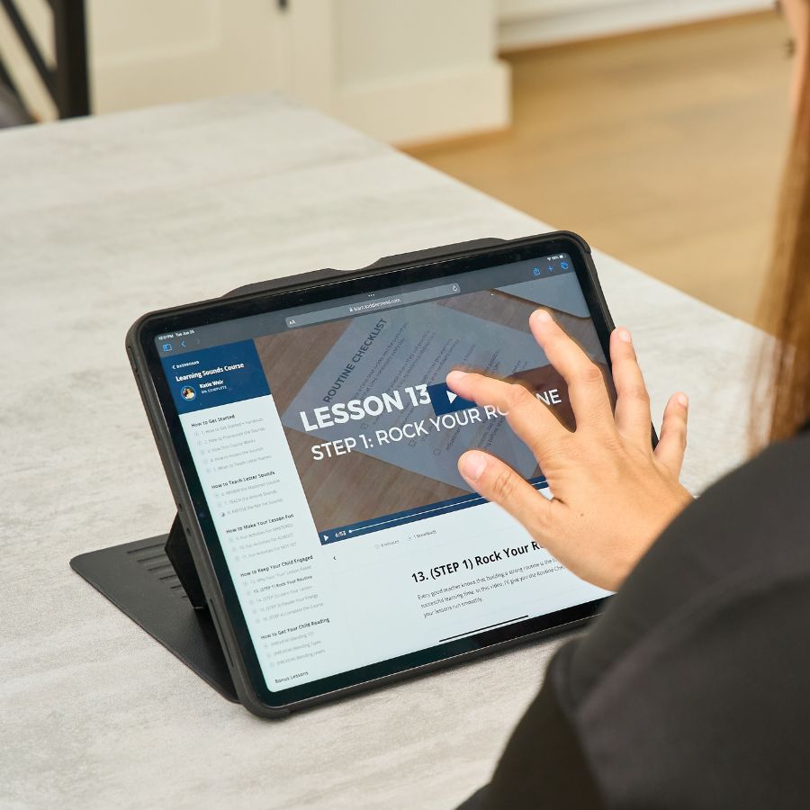 Parent using an iPad to review courseware